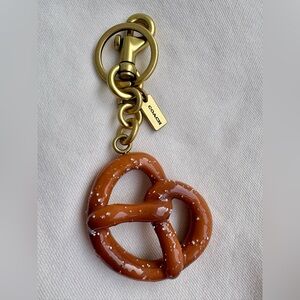 Coach Pretzel charm , new, no tags